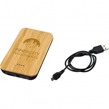 Logotrade Werbegeschenke das Foto: Future 6.000 mAh kabellose Powerbank mit Ladefunktion aus Bambus/Stoff